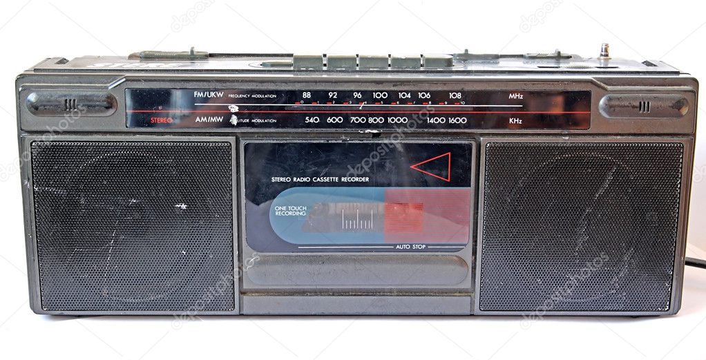 Old cassette tape-recorder on white background