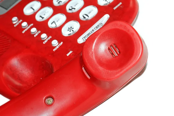 Old red telephone on white background — Stock Photo, Image