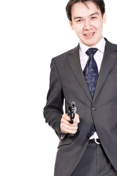 Porträt eines lächelnden jungen Geschäftsmannes mit Waffe. — Stockfoto