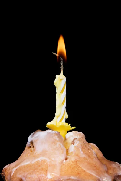 Кекс со свечой — стоковое фото