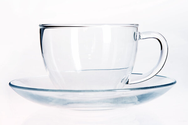 Empty Glass cup and saucer