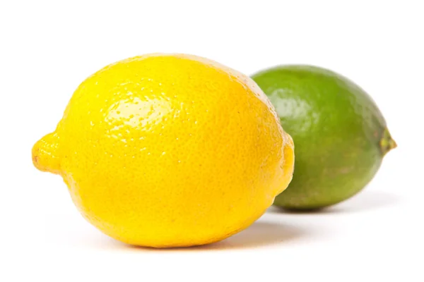 Lemon and green lime — Stock Photo, Image