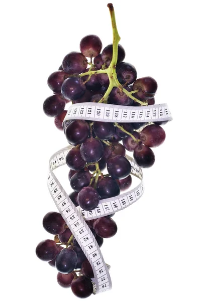 Ruban à mesurer autour des raisins — Photo