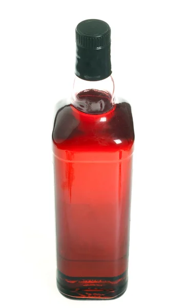 Láhev alkoholu, izolované na bílém — Stock fotografie