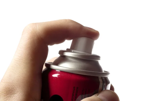 Spray in der Hand isoliert auf weiß — Stockfoto