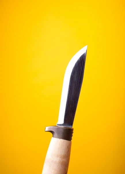 Knife on yellow — Stock Photo, Image