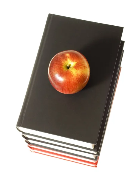 Boek en apple Stockfoto