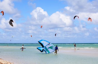 Kitesurfing on the coast of Cuba. Cayo Guillermo in Atlantic Oce clipart