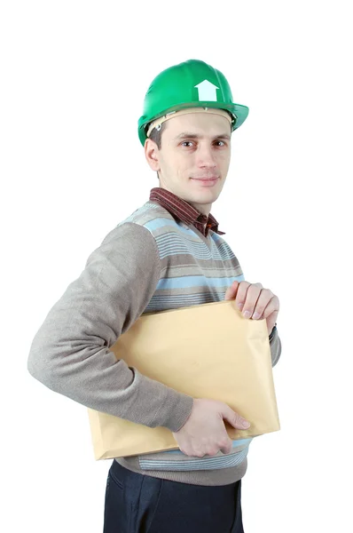 Ung arbetstagare med ett paket i handen — Stockfoto