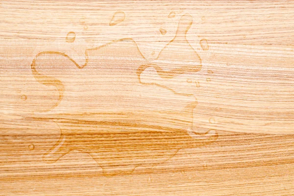 Gocce sulla tavola di legno — Foto Stock