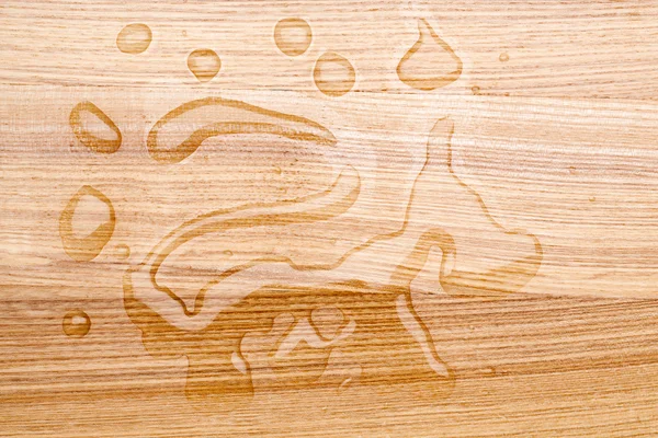 Drops on the wooden board — Stock Photo, Image