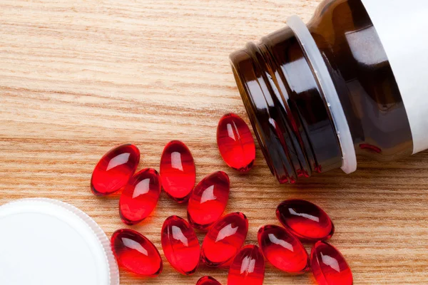 Pot of capsule pills — Stock Photo, Image