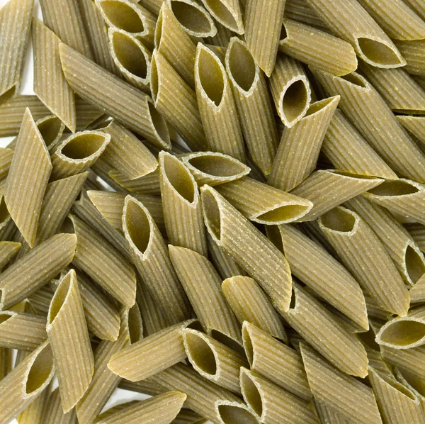 Green colored penne pasta — Stock Photo, Image