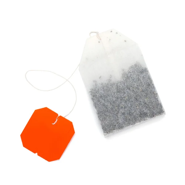 Teabag with red label — Stock Photo, Image