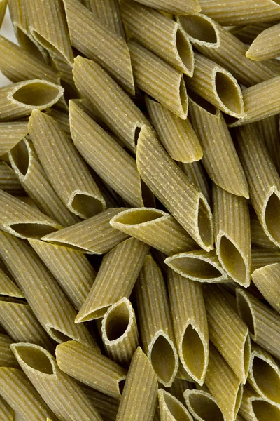 Green colored penne pasta — Stock Photo, Image