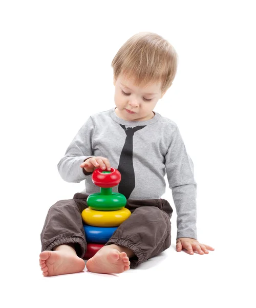 Small baby with a toy pyramid — Stock Photo, Image
