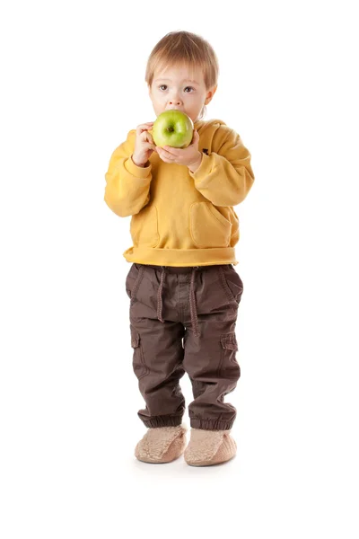 Ребенок с зеленым яблоком — стоковое фото