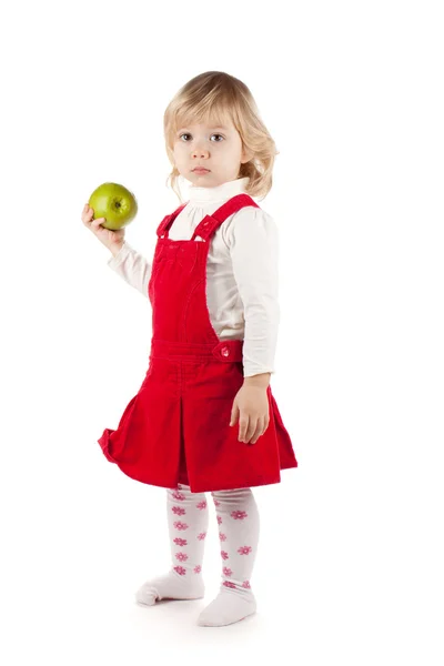 Baby girl with apple — Stock Photo, Image