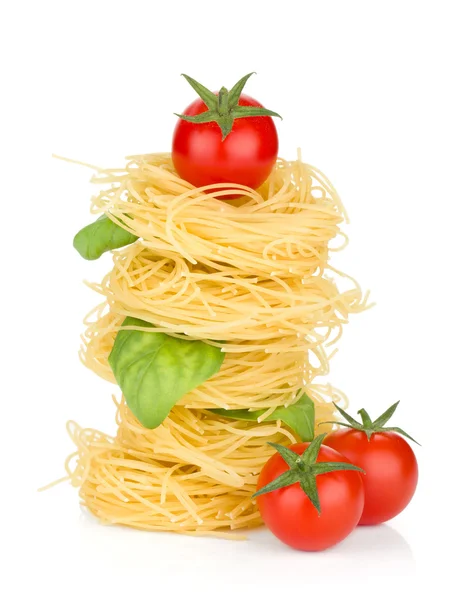 Italian pasta, tomatoes and basil — Stock Photo, Image