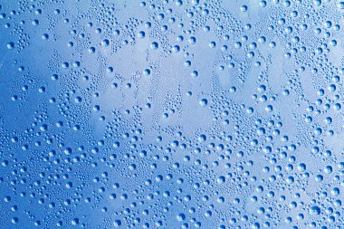 Water drops on a grey-blue background clipart