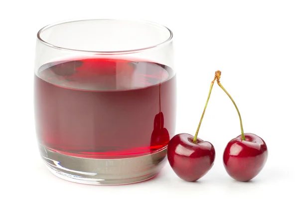 stock image Cherries and a glass of cherry juice isolated on white