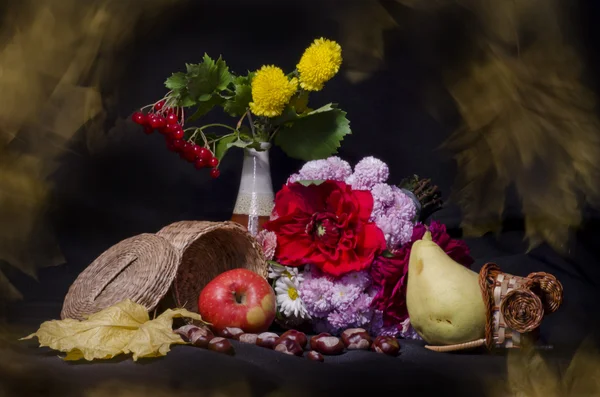 stock image Still life with autumn fruits and flowers on black background