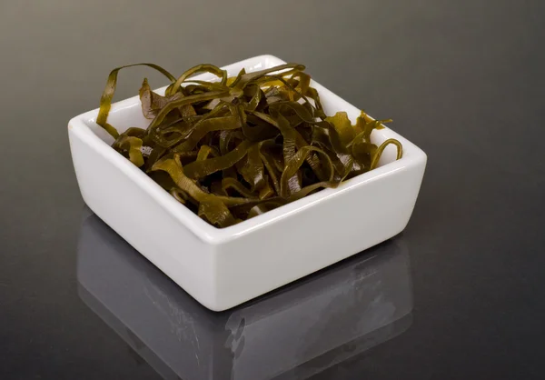 Seaweed on white bowl — Stock Photo, Image