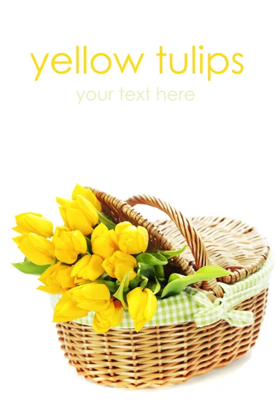 Tulipanes amarillos en una cesta —  Fotos de Stock