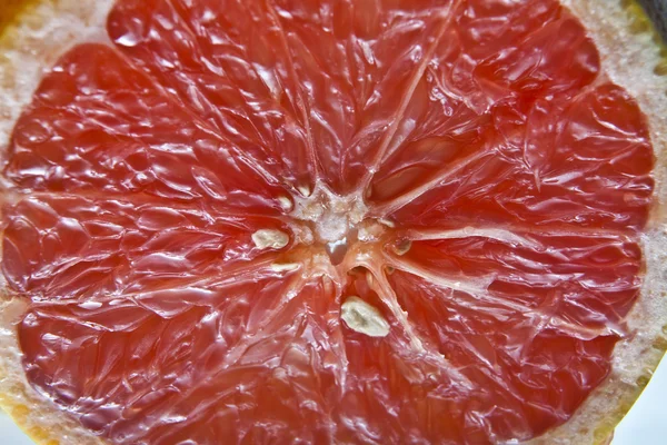 Červený grapefruit řezy. — Stock fotografie