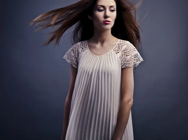 Sensual girl posing. Studio shot on gray background. — Stock Photo, Image