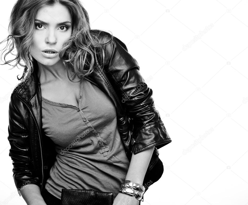 Beautiful young woman on leather jacket.