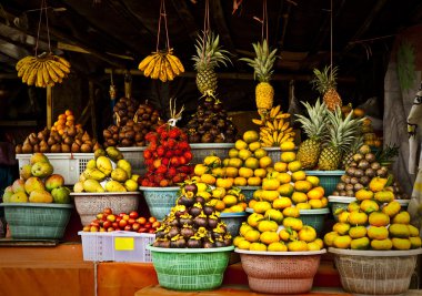 Open air fruit market in the village clipart