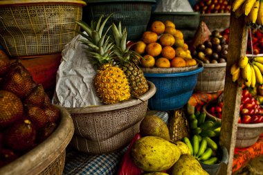 Open air fruit market in the village clipart