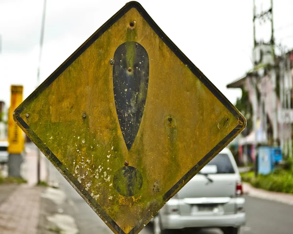 Old grunge warning traffic sign — Stock Photo, Image