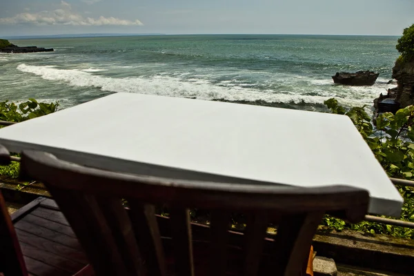 Chair near ocean — Stock Photo, Image