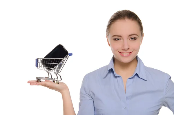 Smartphone in shopping trolley on the women palm — Stock Photo, Image