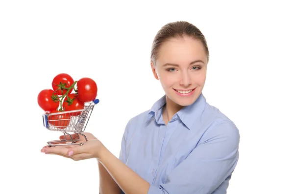 Branch with tomatoes in trolley on the women palm — Stock Photo, Image