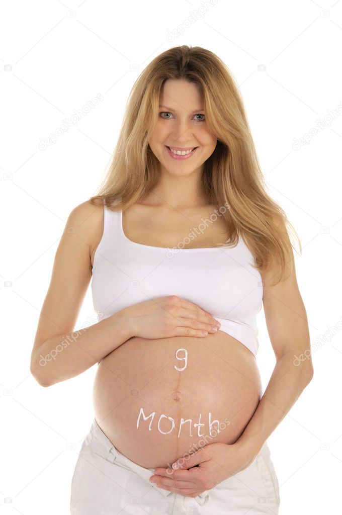 Pregnant woman with an inscription on the belly