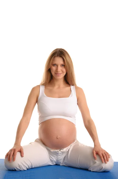Mujer embarazada sentada — Foto de Stock