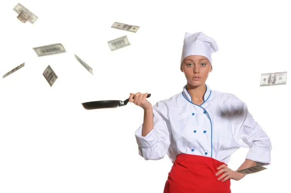 Woman-cook frying pan catches money — Stock Photo, Image
