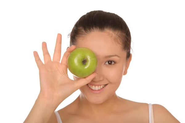 Lachende Aziatische vrouw met groene apple — Stockfoto