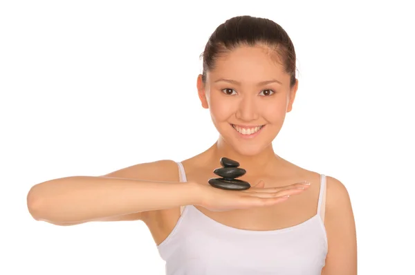 Mujer asiática feliz con pirámide de piedras —  Fotos de Stock