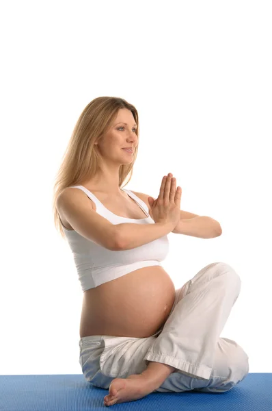 Těhotná žena sedící — Stock fotografie