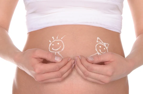 Pregnant belly with picture of children and hands — Stock Photo, Image