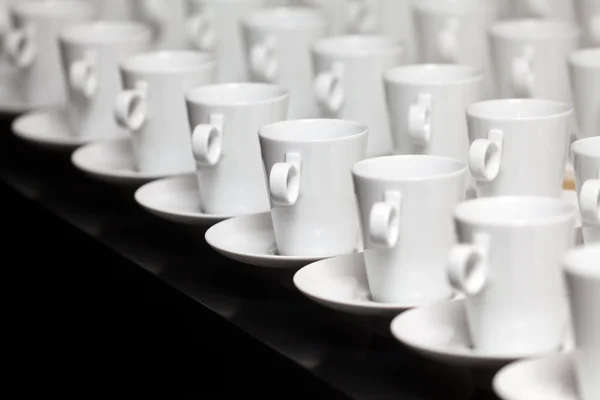 Många vita kaffemuggar — Stockfoto