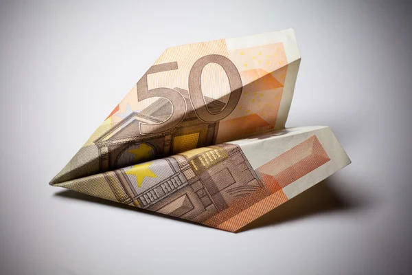 Paper airplane model made of money — Stock Photo, Image