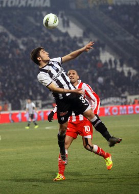 Football match between Paok and Olympiakos (0-2) clipart