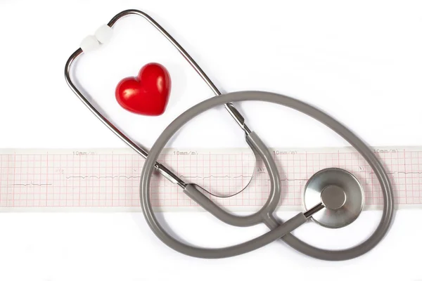 Estetoscopio, corazón rojo y cardiograma — Foto de Stock