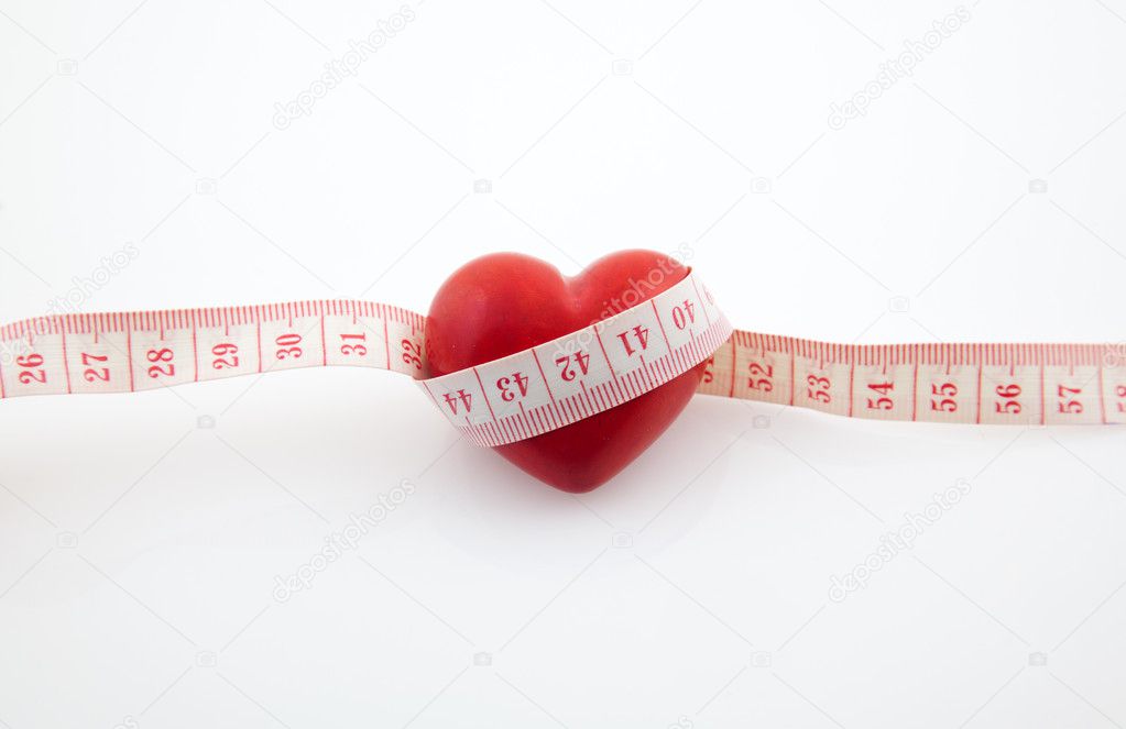 Red heart surrounded by a tape measure