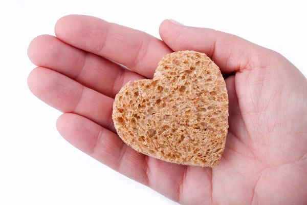 Кусок хлеба, предложенный с любовью - изолированный на белом — стоковое фото